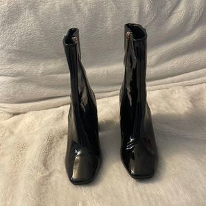 black heeled boot